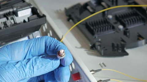 Installation of a yellow fiber optic cable Stock Footage 91089698