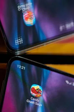 Installed candy crush game on smartphone Stock Photos