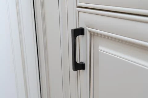 Installed kitchen cabinet handles Stock Photos