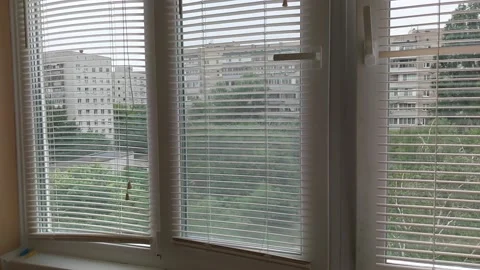 Installed metal-plastic windows on the balcony of a residential building Видео 204020406