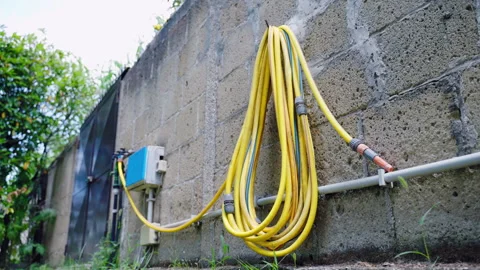 Installed water faucets with timer box for irrigation system Stock Footage 288452755