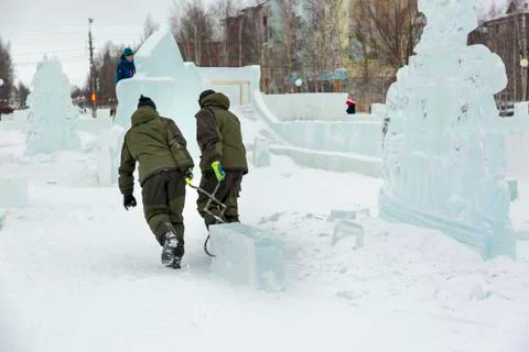 Installers at the construction of the ice town 스톡 사진