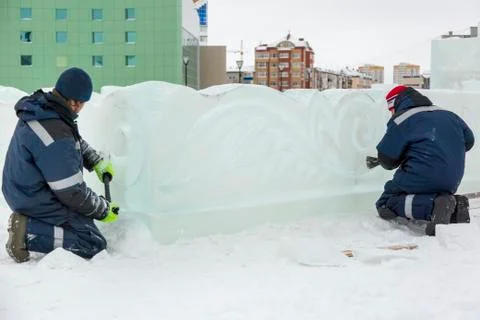 Installers at the construction of the ice town 写真素材