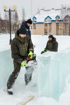 Installers at the construction of the ice town 스톡 사진