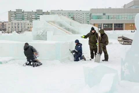 Installers at the construction of the ice town 스톡 사진
