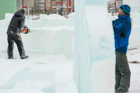 Installers at the construction of the ice town 스톡 사진