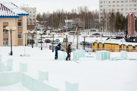 Installers at the construction of the ice town 스톡 사진