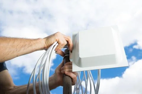 Installing 4G antenna. Mobile coverage. Stock Photos