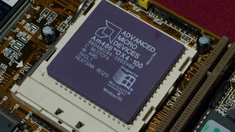 Installing AMD 486 CPU on Vintage Motherboard Stock Footage 295755970