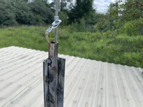 Installing and assembling lightning rod system Stock Photos