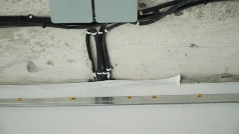 Installing and maintenance stretch ceiling in new flat Stock Footage 251385420