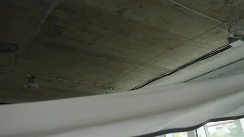 Installing and maintenance stretch ceiling in new flat Stock Footage 251385871