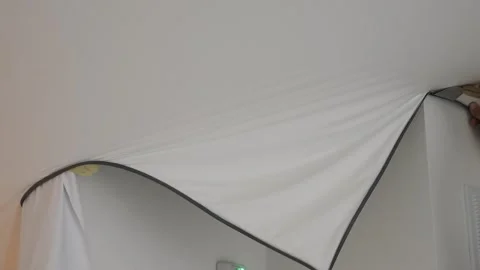Installing and maintenance stretch ceiling in new flat Stock Footage 262274892