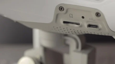 Installing and removing memory card from quadrocopter. Preparing a drone before 库存影片 128631117