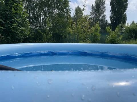 Installing and setting up inflatable pool Stock Photos