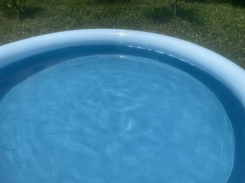 Installing and setting up inflatable pool Stock Photos