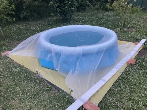 Installing and setting up inflatable pool Stock Photos