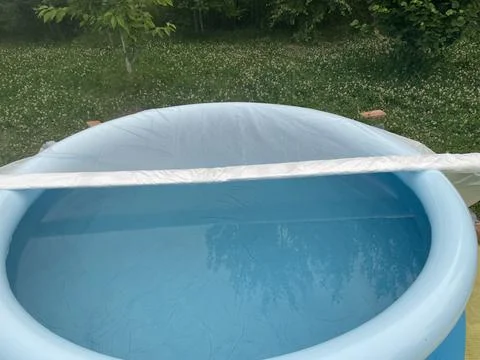 Installing and setting up inflatable pool Stock Photos