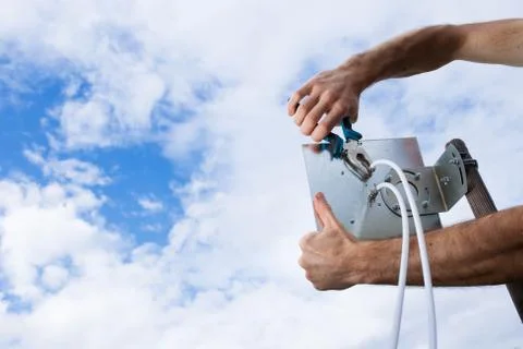 Installing antenna for mobile internet. Foto stock