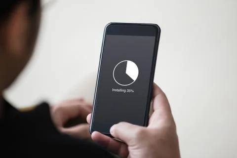 Installing application process on smartphone concept Stock Photos