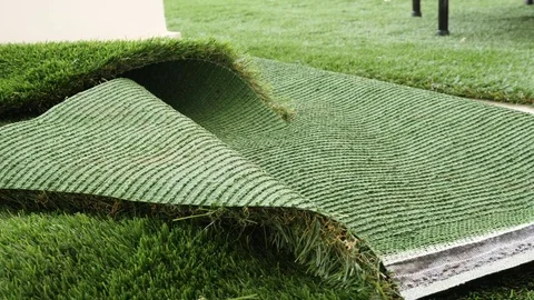 Installing artificial lawn on a balcony Stock Footage