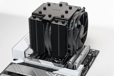 Installing a be quiet CPU cooler Dark Rock Pro 4 on the motherboard. Stock Photos