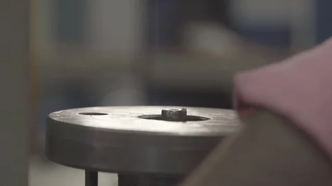 Installing bearing to machine - Shot on Sony FS7 Stockbeeldmateriaal 91174659