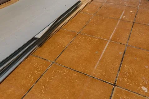Installing Blue Foam Underlay for Vinyl or Laminate Flooring Home Renovation Stock Photos