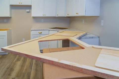 Installing cabinets and laminate kitchen counter top Stock Photos