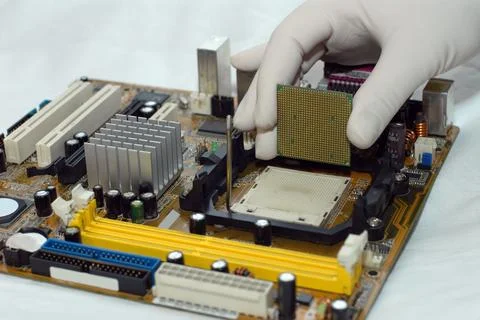 Installing Central processor Stock Photos