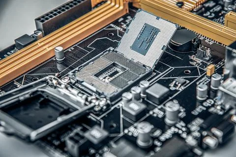 Installing central processor unit into computer motherboard. 写真素材