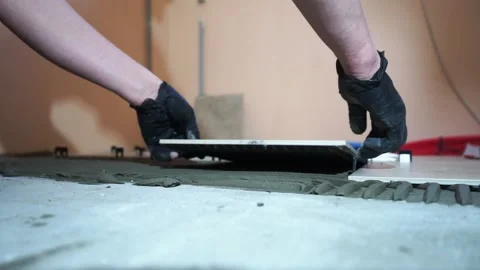 Installing ceramic floor tiles Stock-Footage 150962894