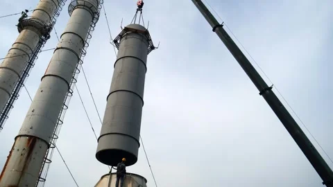 Installing the chimney section with a crane Stock Footage 249526863