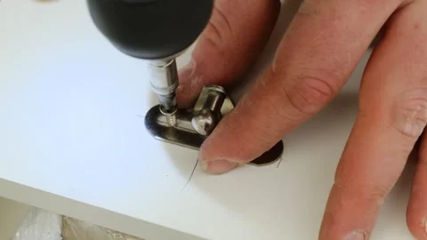 Installing clip using screwdriver during furniture assembly 스톡 동영상 316187317