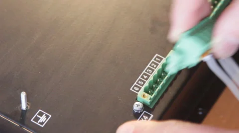 Installing the connector into the equipment Stock Footage 65230086