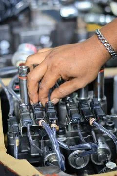 Installing Control Valve Automatic Transmission in workshop services Stock Photos