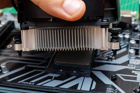 Installing a cooler on a personal computer processor. The process of upgradin 写真素材