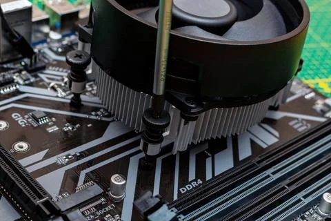 Installing a cooler on a personal computer processor. The process of upgradin 写真素材