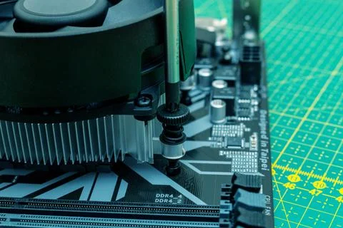 Installing a cooler on a personal computer processor. The process of upgradin Foto stock