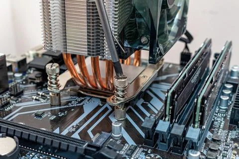Installing a cooler on a personal computer processor. The process of upgradin Stock Photos