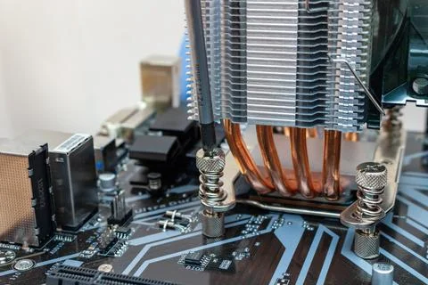 Installing a cooler on a personal computer processor. The process of upgradin Stock Photos