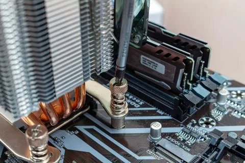 Installing a cooler on a personal computer processor. The process of upgradin 스톡 사진