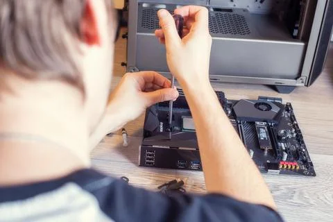 Installing a cooler on a personal computer processor. 写真素材