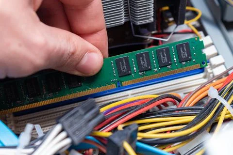 Installing ddr dimm memory, assembling personal computer in a service, hand u Stock Photos