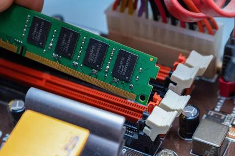 Installing ddr dimm memory, assembling personal computer in a service, hand u Stock Photos