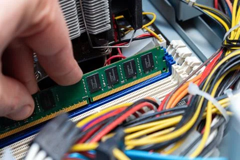 Installing ddr dimm memory, assembling personal computer in a service, hand u Stock Photos