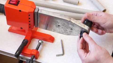 Installing die head on welding machine Stock Footage 60232618