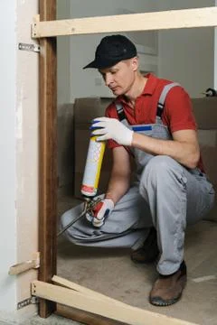 Installing door unit. Stock Photos