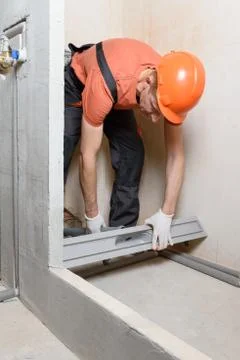 Installing a drain in the shower bo Stock Photos