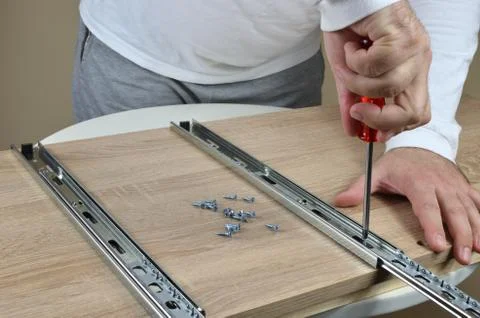 Installing Drawer Slides Stock Photos